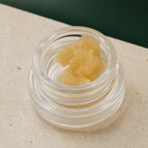 Cuban Linx Live Resin open jar macro showing golden concentrate texture