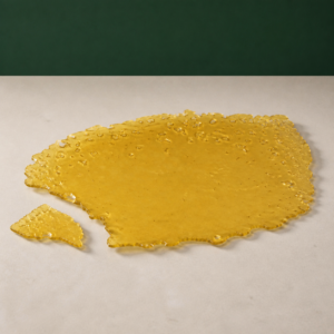 Good Giggles - Gelato House Shatter 1g on a pale stone surface