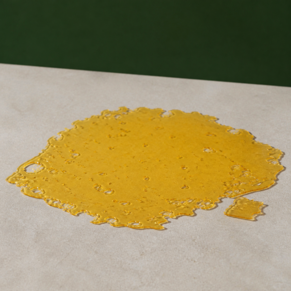 Good Giggles - Jungle Cake House Shatter 1g on a pale stone surface