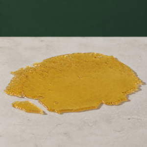 Good Giggles - Runtz House Shatter 1g on a pale stone surface