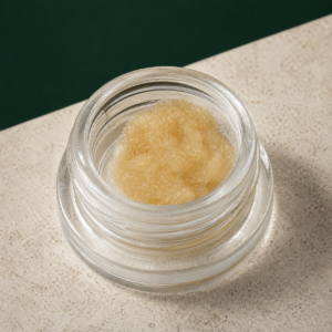 Gorilla Glue Live Resin open jar macro showing pale golden concentrate texture