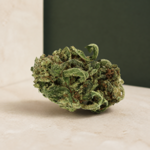 Green Monster Breath AA flower rounded side-angle macro with pale green leaf detail