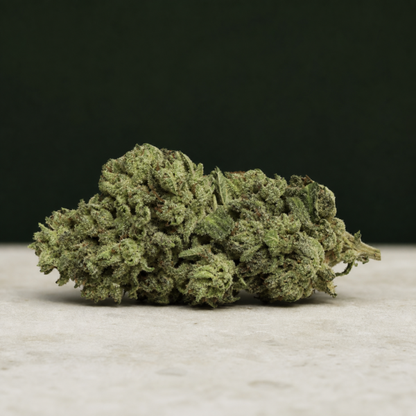 Jack Rabbit cannabis flower on a pale stone surface
