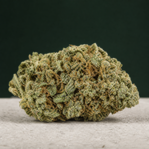 Marty McHigh cannabis flower on a pale stone surface