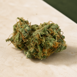 Memory Loss cannabis flower on a pale stone studio surface
