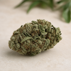 The Undercaker cannabis flower on a pale stone studio surface